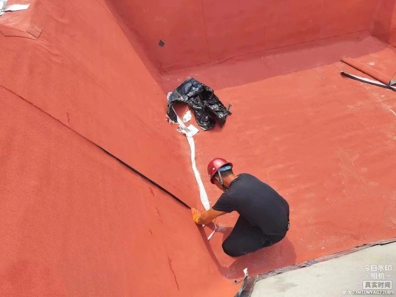 1669692912621187.jpg “中国红”立面施工效果.jpg